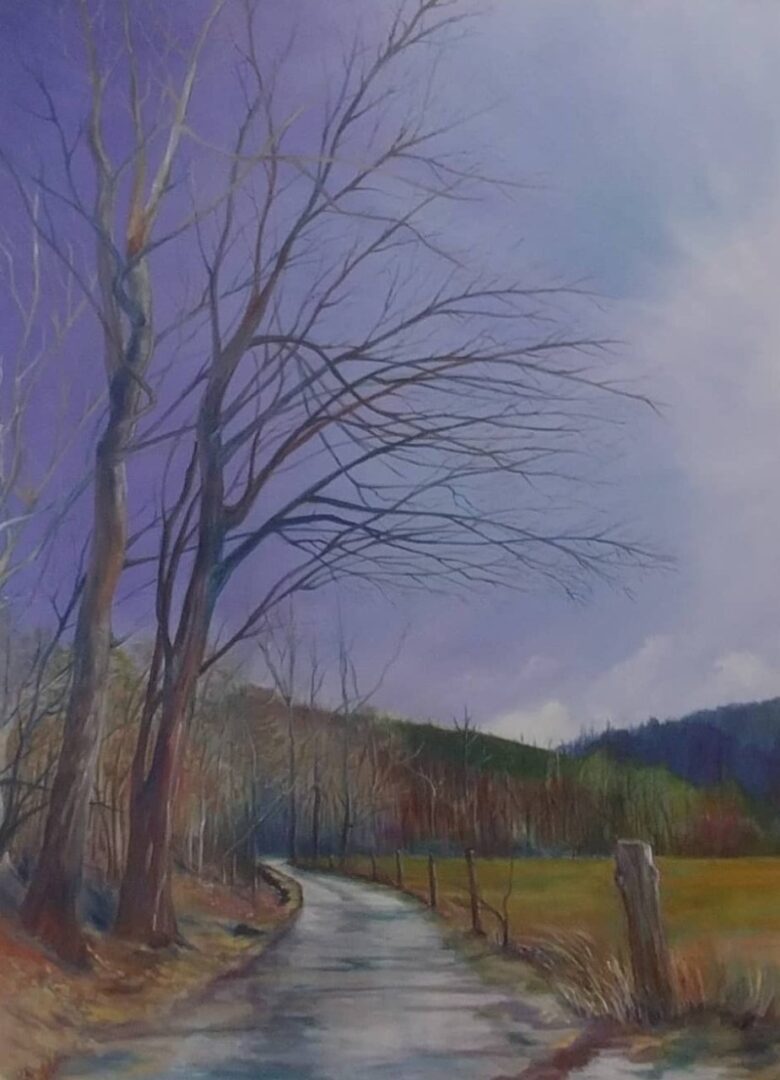 Portrait image of a tree with long path