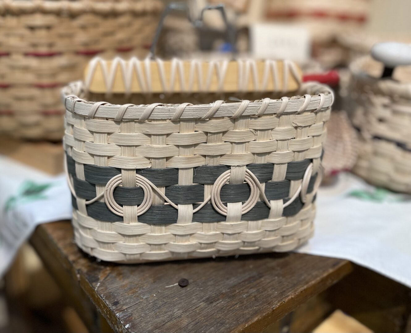 A basket is sitting on top of a table.