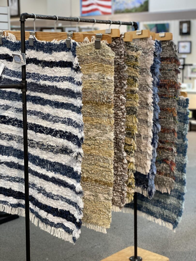 Rugs on display in a store.