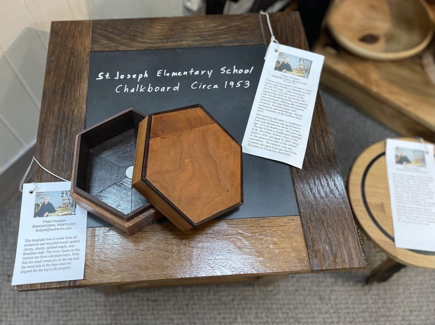 A wooden box with a sign on it.