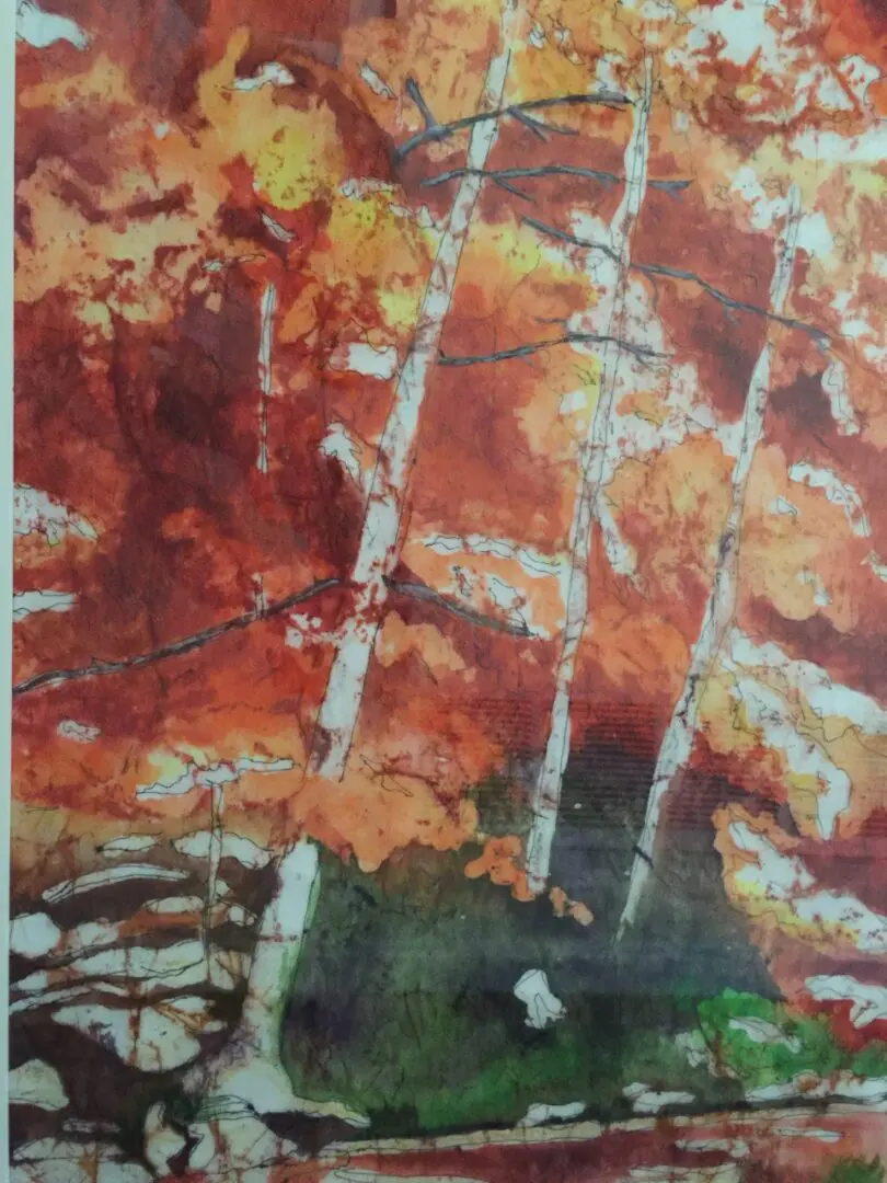 A watercolor painting of trees in the fall.