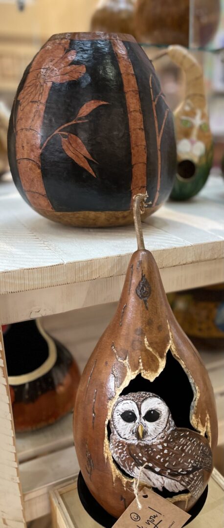 Hand-painted gourds with owl design.