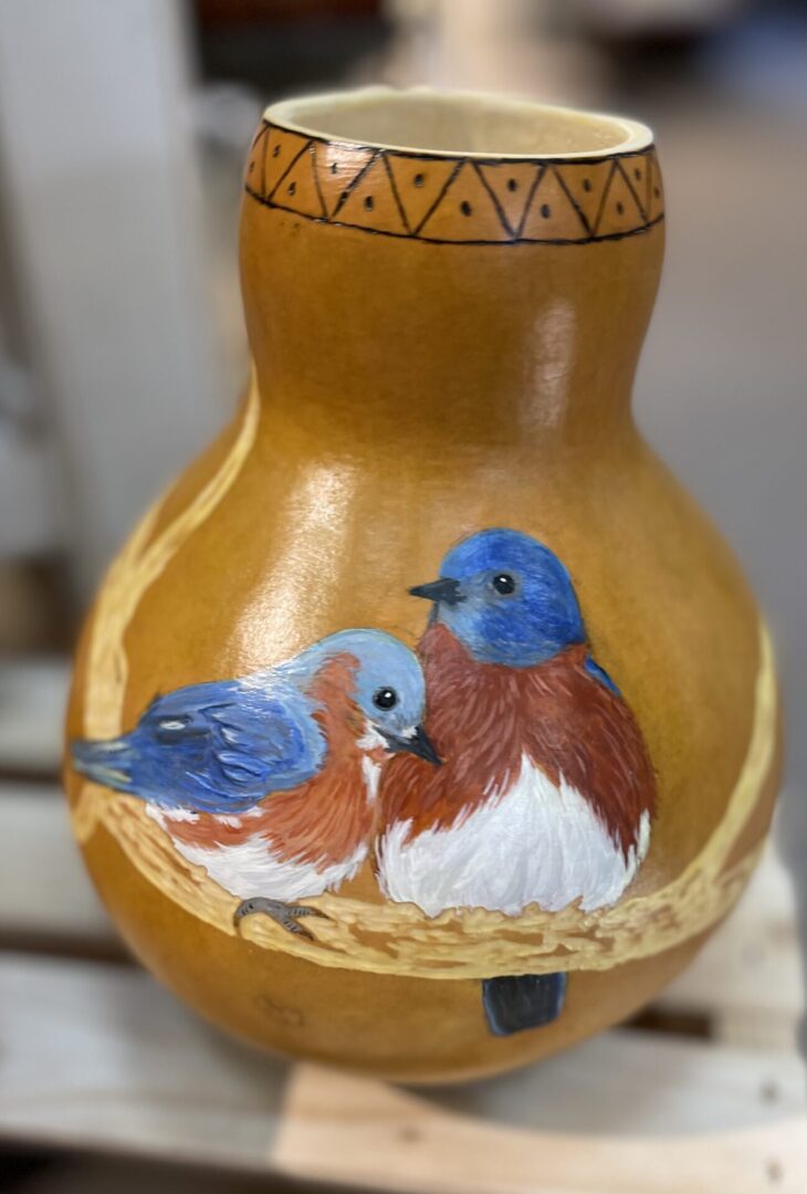 Gourd vase with bluebird painting.