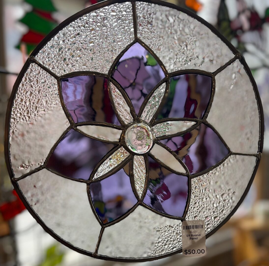 Purple and white stained glass flower panel.