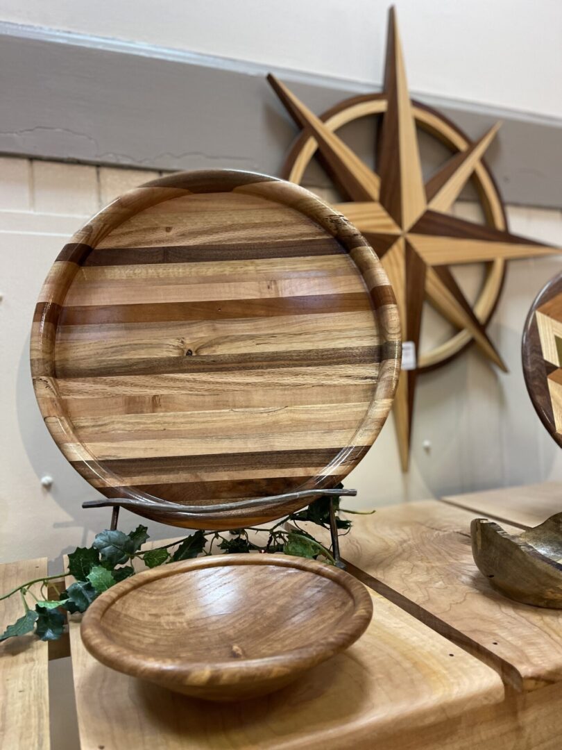 Wood tray and bowl on a table.